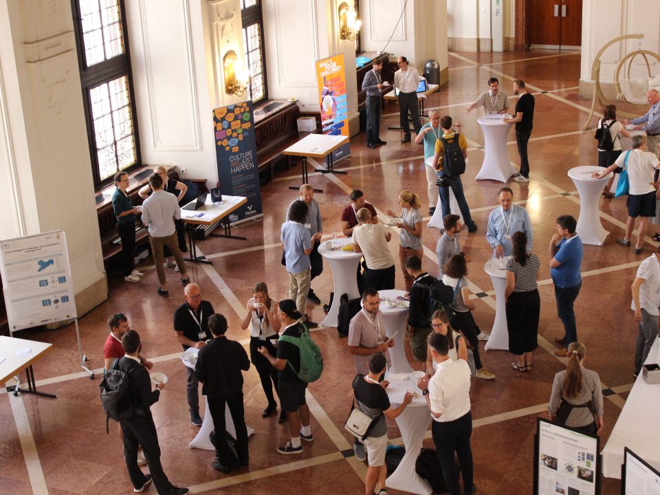 People chatting at the event.