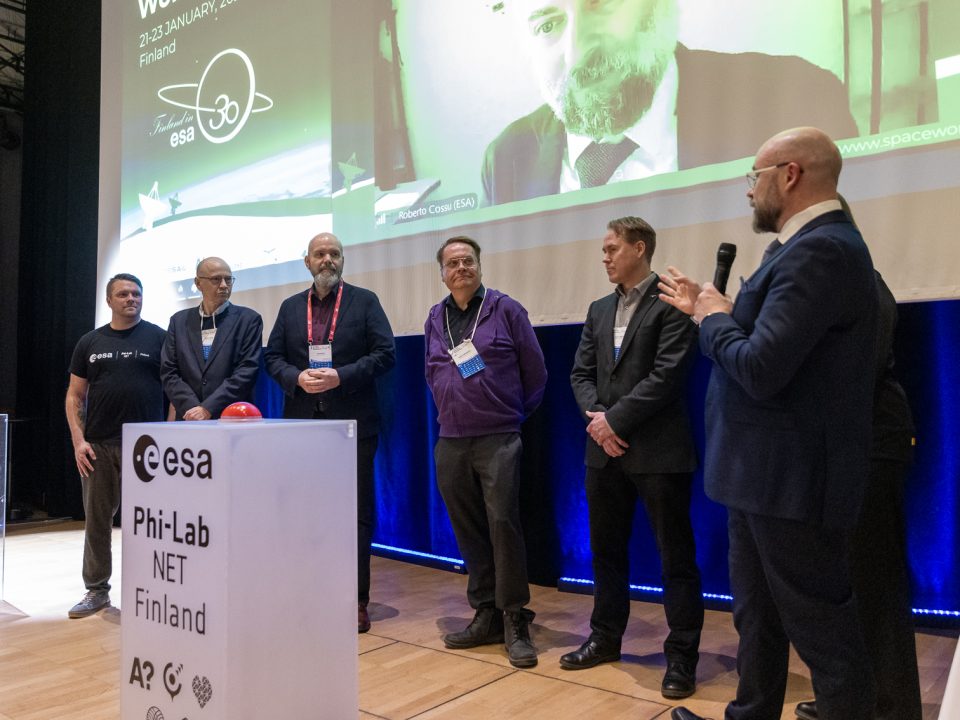 ESA Phi-Lab Finland consortium representatives on stage at the Winter Satellite Workshop.